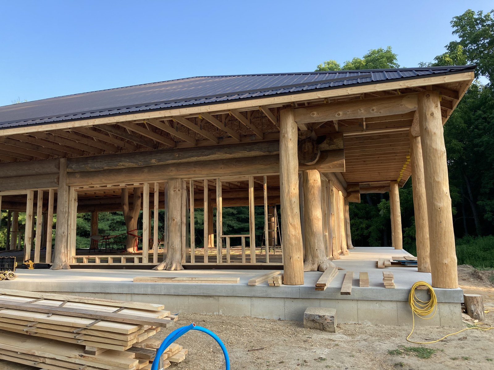 Custom cottage covered porch framing and timber posts