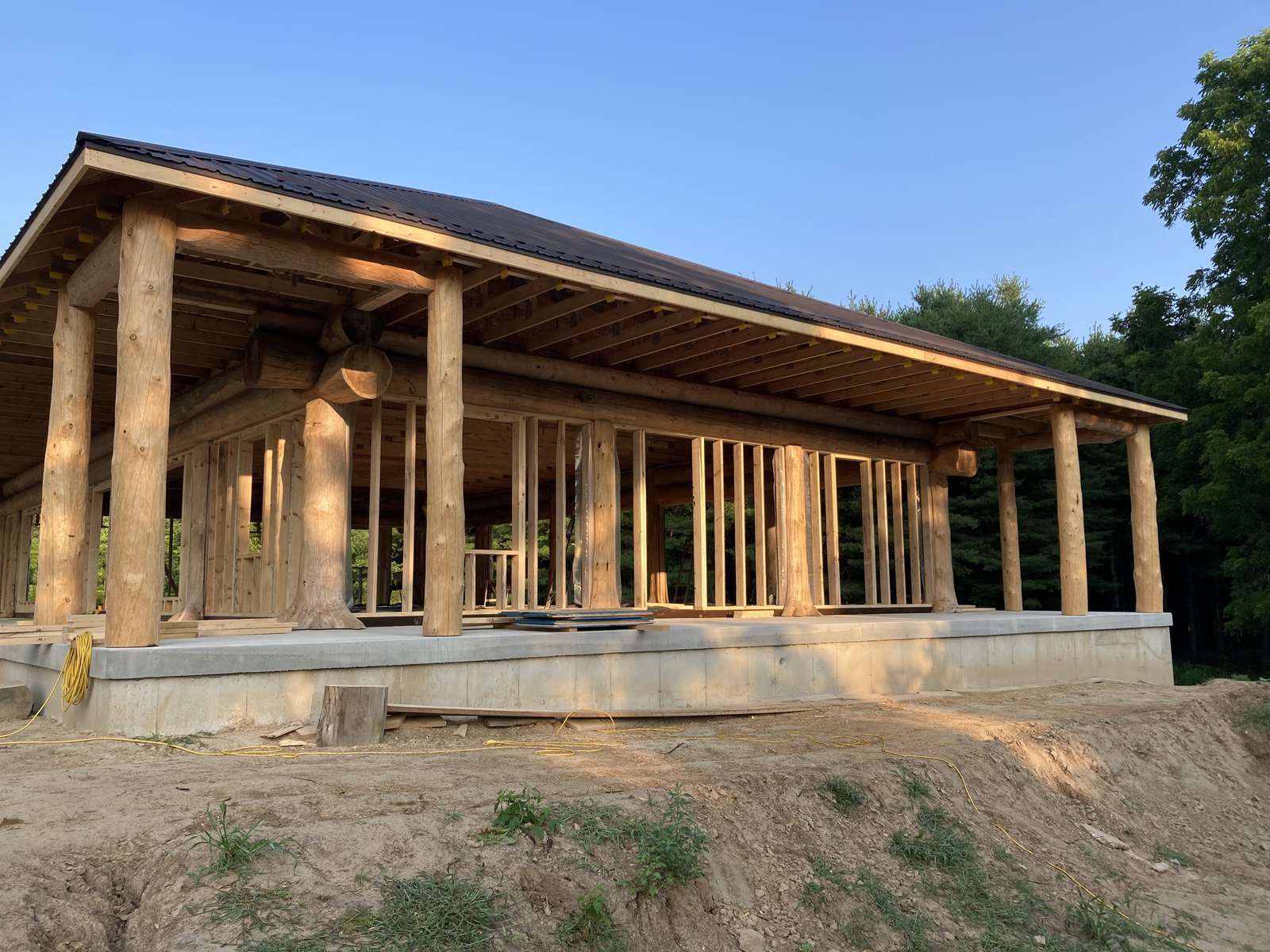 Custom cottage timber posts and covered porch framing
