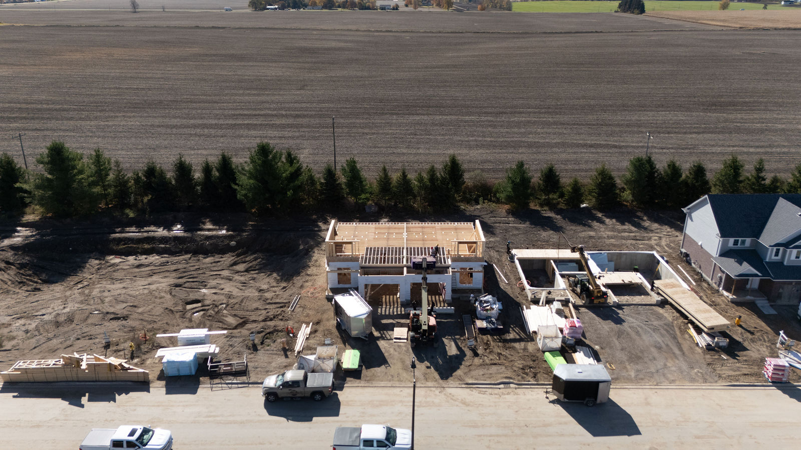 Drone view of a custom home framing project by Cutting Edge Carpentry