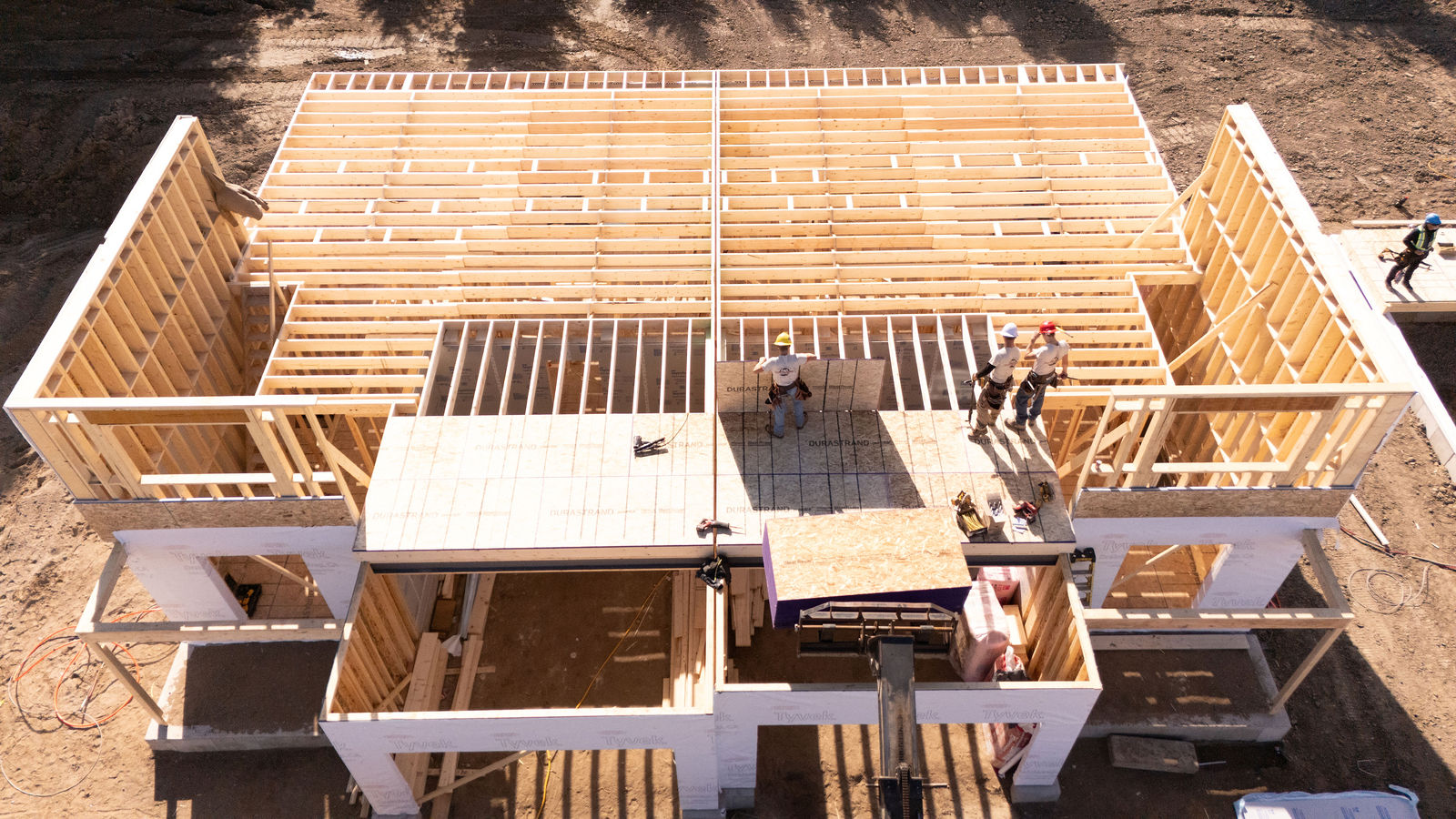 Crew working on residential framing