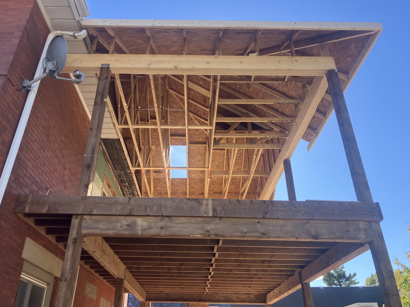 Underside framing details for a raised deck build